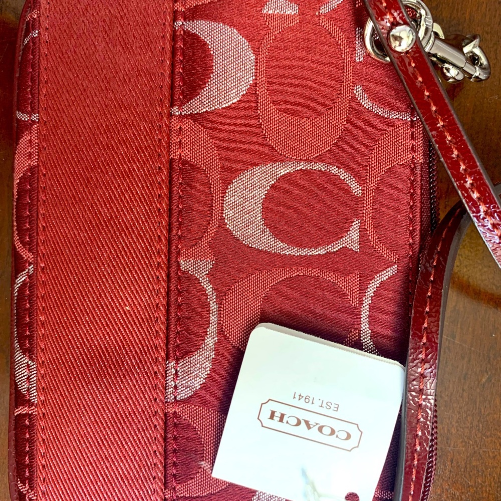 New Coach wristlet with tags